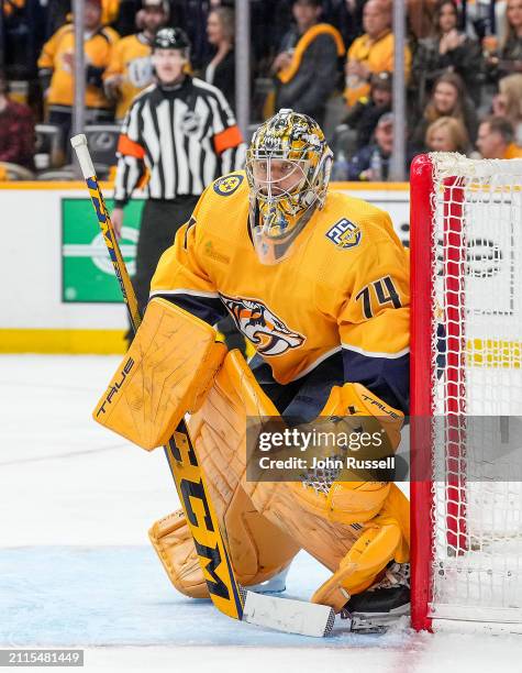 Juuse Saros of the Nashville Predators tends net against the Detroit Red Wings during an NHL game at Bridgestone Arena on March 23, 2024 in...