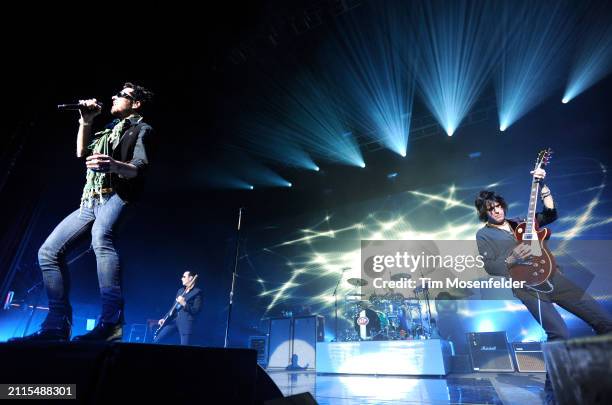 Robert DeLeo, Scott Weiland, and Dean DeLeo of Stone Temple Pilots perform at the Fox Theater on October 20, 2009 in Oakland, California.