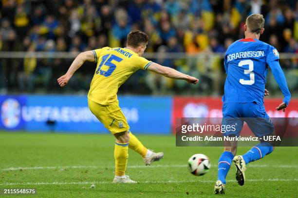 Viktor Tsygankov of Ukraine scores his team's first goal during the UEFA EURO 2024 Play-Offs final match between Ukraine and Iceland at Tarczynski...