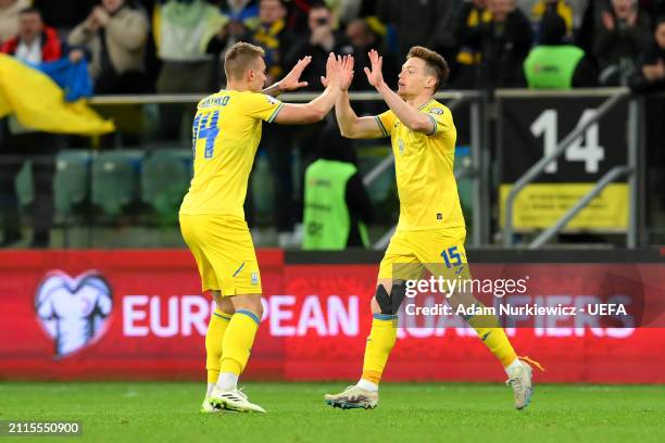 Viktor Tsygankov of Ukraine celebrates with Volodymyr Brazhko of Ukraine after scoring his team's first goal during the UEFA EURO 2024 Play-Offs...