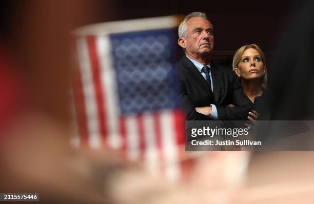 Actress Cheryl Hines and her husband, Independent presidential candidate Robert F. Kennedy Jr., look on during a campaign event to announce his pick...