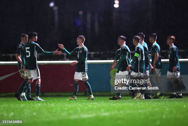 Braiden Graham of Northern Ireland celebrates with teammates after scoring their team's third goal during the Under-17 EURO Elite Round match between...