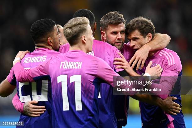 Niclas Fuellkrug of Germany celebrates scoring his team's second goal with teammates during the International Friendly match between Germany and...