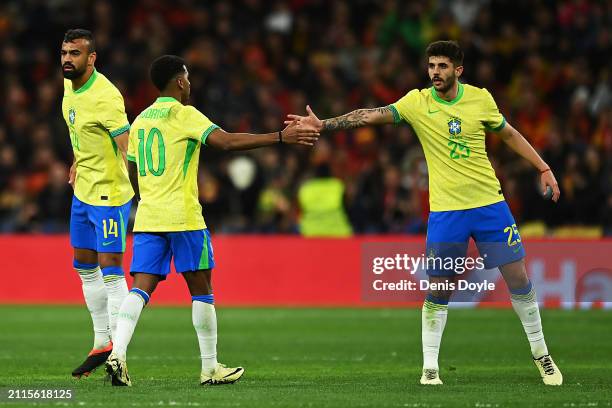 Rodrygo of Brazil celebrates scoring his team's first goal with teammate Lucas Beraldo during the friendly match between Spain and Brazil at Estadio...