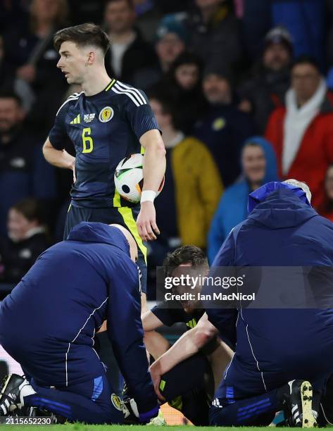 Scotland captain Andy Robertson sits on the pitch injured during the international friendly match between Scotland and Northern Ireland at Hampden...