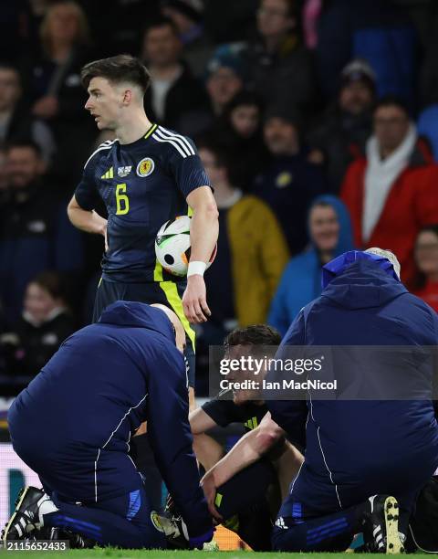 Scotland captain Andy Robertson sits on the pitch injured during the international friendly match between Scotland and Northern Ireland at Hampden...