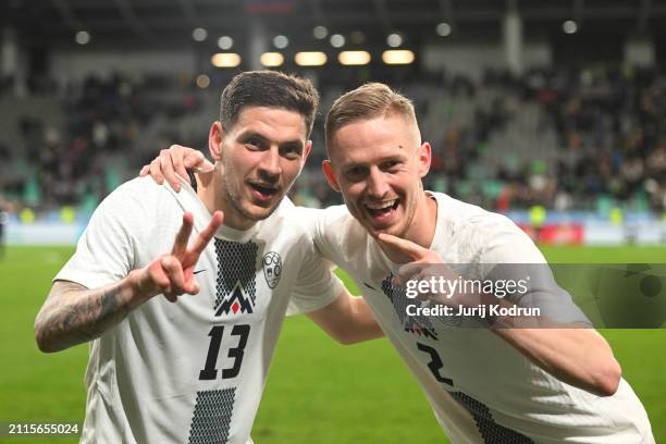 Erik Janza and Zan Karnicnik of Slovenia celebrate after the team's victory during the international friendly match between Slovenia and Portugal at...