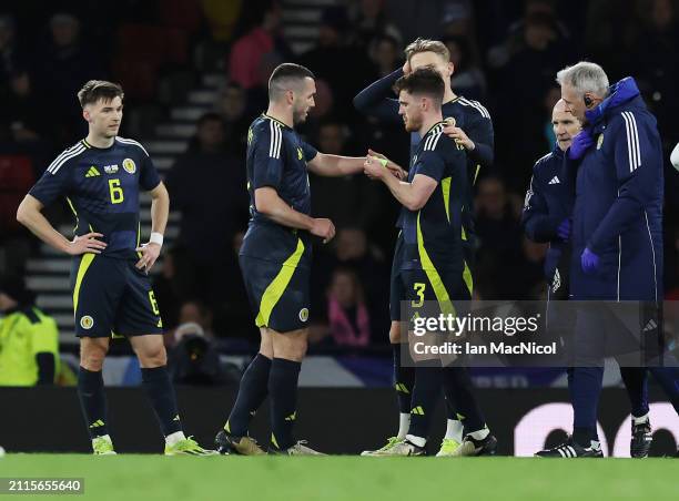 John McGinn takes the captains arm band from Andy Robertson during the international friendly match between Scotland and Northern Ireland at Hampden...