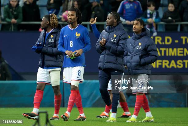 Manu Kone, Khephren Thuram, Castello Lukeba, Wilson Odobert of France salute the supporters following the U23 international friendly match between...