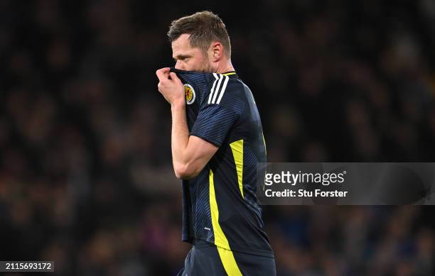 Scotland player Liam Cooper reacts during the international friendly match between Scotland and Northern Ireland at Hampden Park on March 26, 2024 in...
