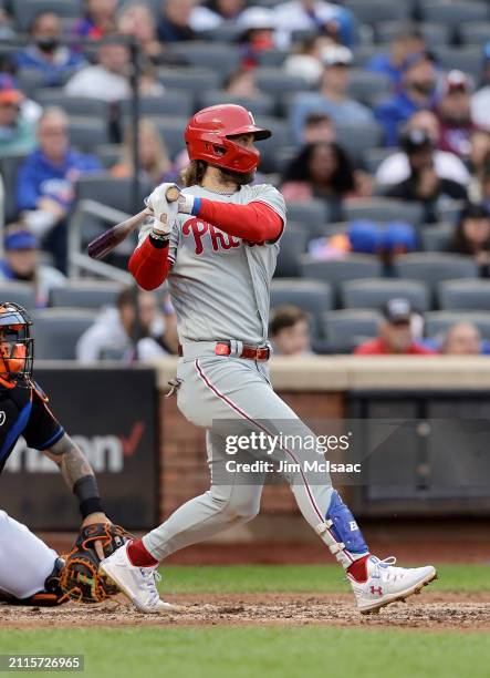 Bryce Harper of the Philadelphia Phillies in action against the New York Mets at Citi Field on September 30, 2023 in New York City. The Mets defeated...