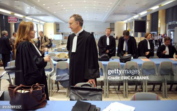 Lawyers of plaintiffs Stella Bisseuil and Thierry Carrere, chat at the Toulouse courtroom on June 29, 2009 for the trial of the September 2001...