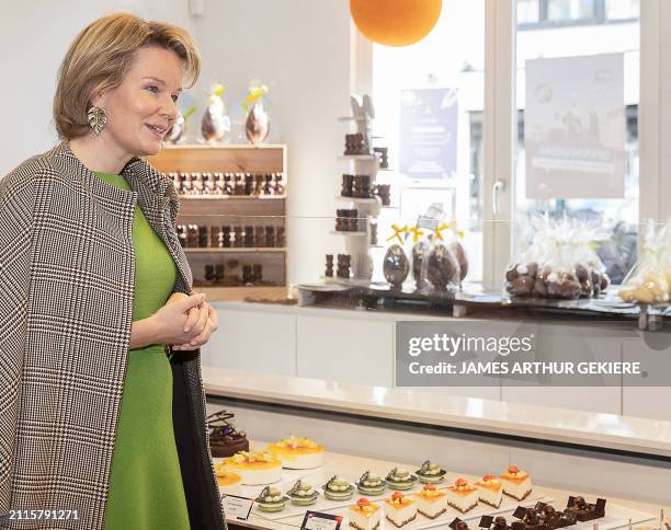 Queen Mathilde of Belgium inspects pastries during a royal visit of the Hotelschool Gent highschool, its catering, bakery and chocolate departments,...