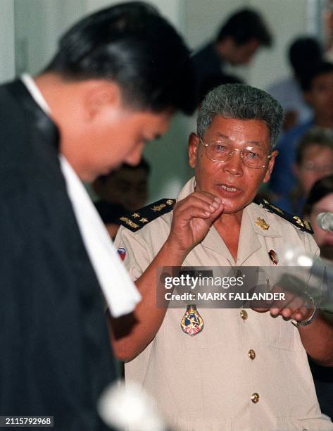 Former Khmer Rouge rebel and now senior government official Sam Bith is questioned in the municipal court, in Phnom Penh, 07 June during the trial of...