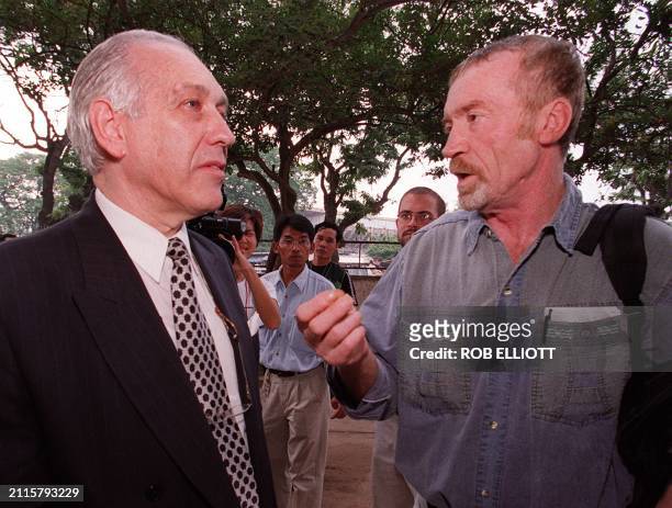 Jean-Claude Braquet , the father of a French backpacker murdered in Cambodia by the Khmer Rouge in 1994, meets with Bob Wodrow , the Australian...