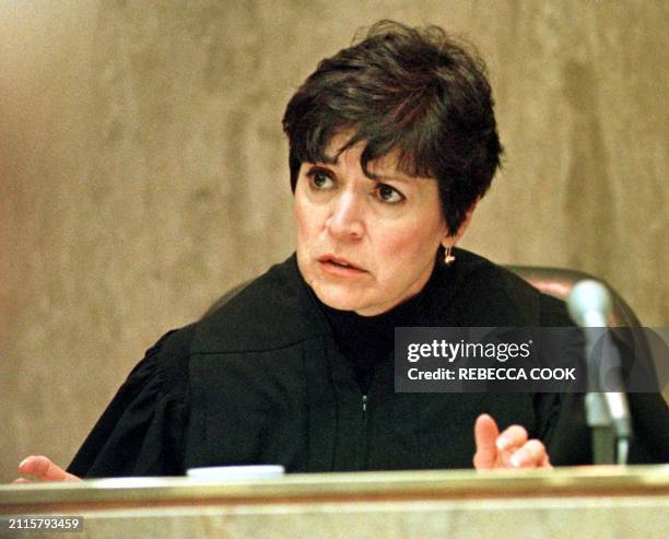 Oakland County Judge Jessica Cooper reads the sentence to Dr. Jack Kevorkian in his murder trial in Pontiac, Michigan, 13 April 1999. Judge Cooper...