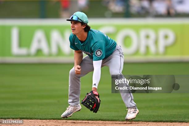 Cole Young of the Seattle Mariners in the field during the eighth inning of a spring training game against the Oakland Athletics at Hohokam Stadium...