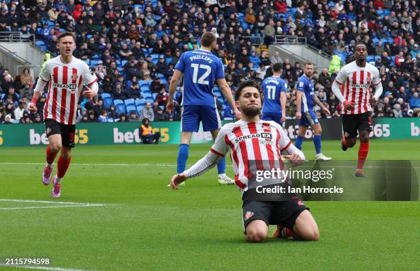 Adil Aouchiche of Sunderland celebrates scoring the opening goal during the Sky Bet Championship match between Cardiff City and Sunderland at Cardiff...