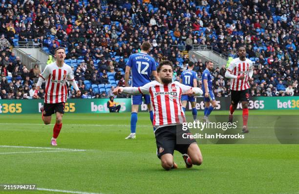 Adil Aouchiche of Sunderland celebrates scoring the opening goal during the Sky Bet Championship match between Cardiff City and Sunderland at Cardiff...