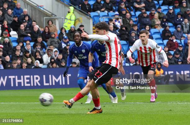 Adil Aouchiche of Sunderland scoring the opening goal from the penalty spot during the Sky Bet Championship match between Cardiff City and Sunderland...