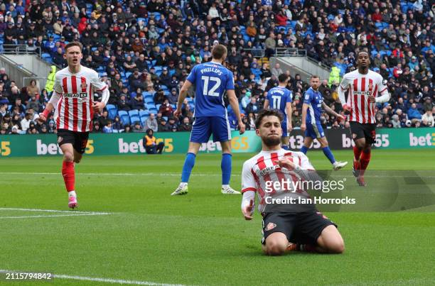 Adil Aouchiche of Sunderland celebrates scoring the opening goal during the Sky Bet Championship match between Cardiff City and Sunderland at Cardiff...