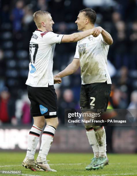 Derby County's Louie Sibley and Kane Wilson celebrate following the Sky Bet League One match at Pride Park Stadium, Derby. Picture date: Friday March...