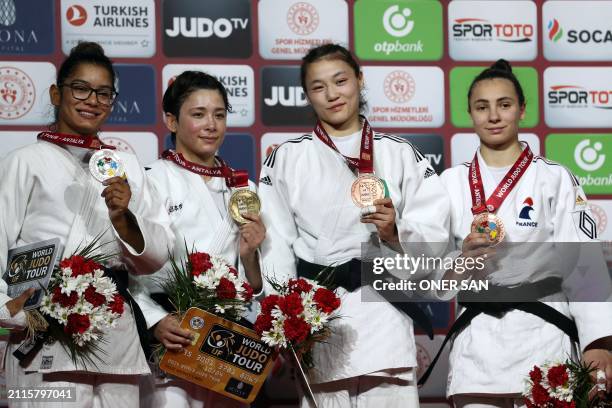 Silver medalist Jessicaa Lima of Brazil, gold medalist Christa Deguchi of Canada, bronze medalists Mayssa Parrdayeva of Tajikistan and Faiza Mokdar...