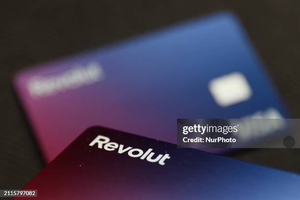 Revolut cards are seen in this illustration photo taken in Krakow, Poland on March 29, 2024.