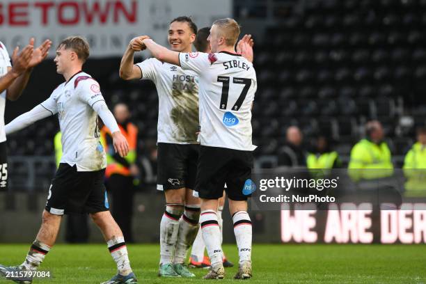 Kane Wilson and Louie Sibley of Derby County are dancing in celebration of their 1-0 victory during the Sky Bet League 1 match between Derby County...