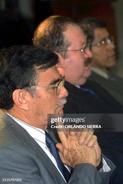 The ex chief of the Estado Mayor Presidencial, general Agusto Godoy, and the Colonel Juan Guillermo Oliva listen, 3 October 2002, Guatemala City, the...