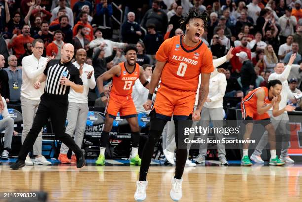 Illinois Fighting Illini guard Terrence Shannon Jr. Reacts to a jam during an NCAA Sweet Sixteen game between the Iowa State Cyclones and the...