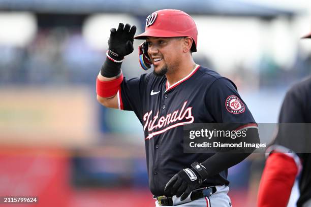 Ildemaro Vargas of the Washington Nationals celebrates hitting a single during the second inning of a spring training game against the New York Mets...