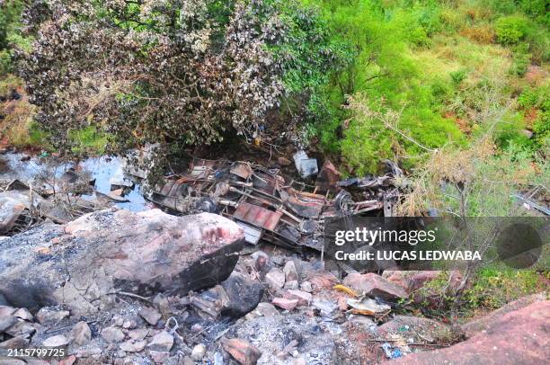 This photo taken on March 29, 2024 shows a general view of the wreckage of the bus in which 46 pilgrims on their way to the annual Zion Christian...