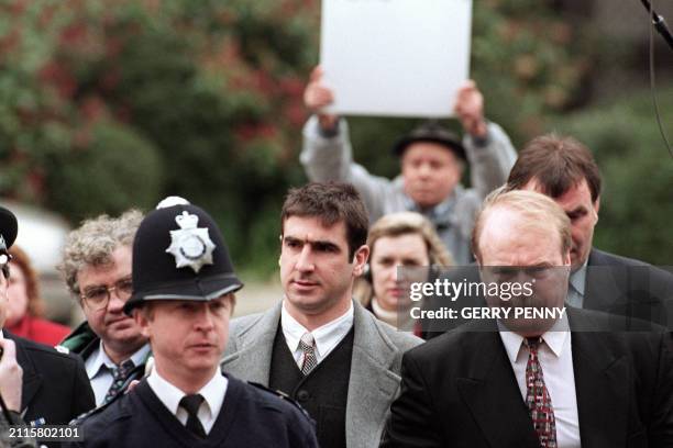 Manchester United's French soccer star Eric Cantona arrives on March 31, 1995 at Croydon Court for his appeal against a two week jail sentence for...