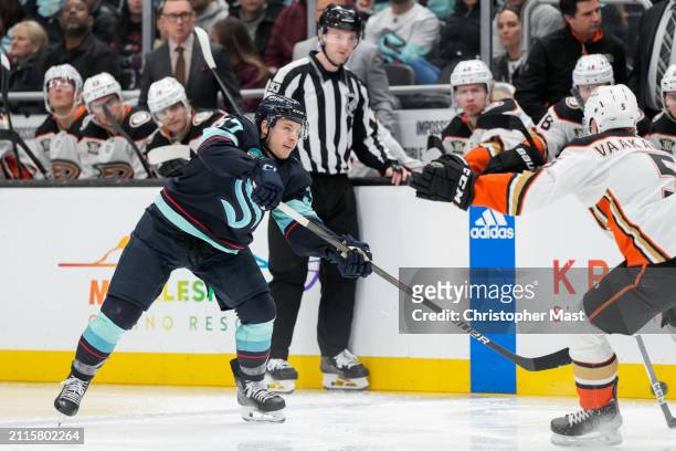 Yanni Gourde of the Seattle Kraken shoots the puck into the corner during the third period of a game against the Anaheim Ducks at Climate Pledge...