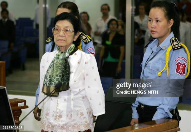 Former Khmer Rouge minister Ieng Thirith , stands in the court room during a hearing at the Extraodinary Chambers in the Court of Cambodia in Phnom...