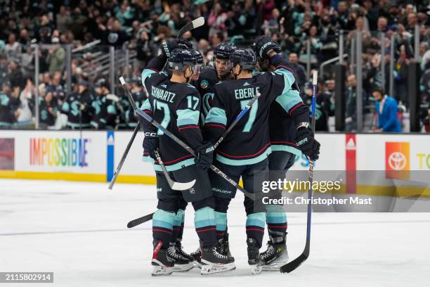 The Seattle Kraken celebrate a goal against the Anaheim Ducks during the third period of a game at Climate Pledge Arena on March 28, 2024 in Seattle,...