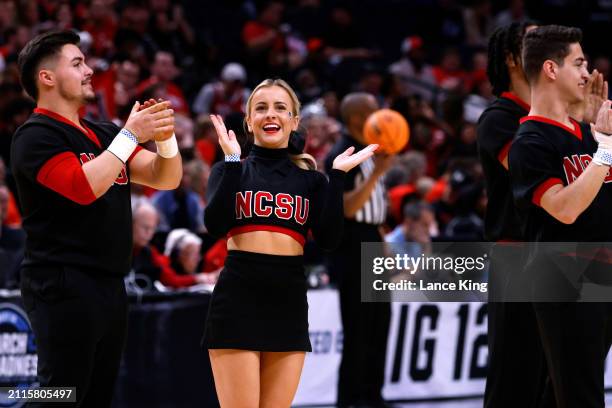 Cheerleaders of the NC State Wolfpack perform during the first half against the Marquette Golden Eagles in the Sweet Sixteen round of the NCAA Men's...