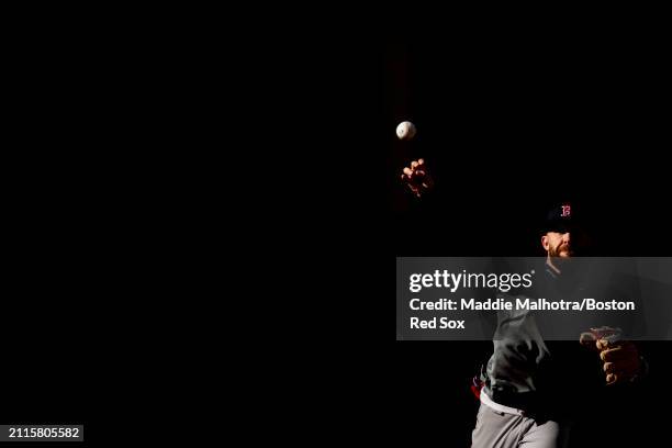 Trevor Story of the Boston Red Sox throws before a game against the Seattle Mariners at T-Mobile Park on March 29, 2024 in Seattle, Washington.