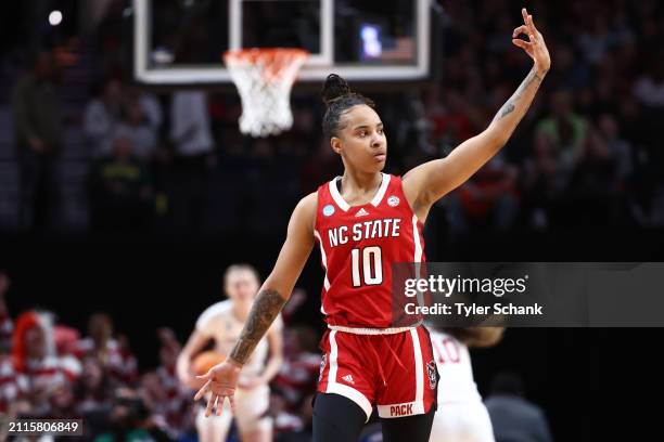 Aziaha James of the NC State Wolfpack reacts after making a three point basket during the Sweet Sixteen round of the 2024 NCAA Women's Basketball...