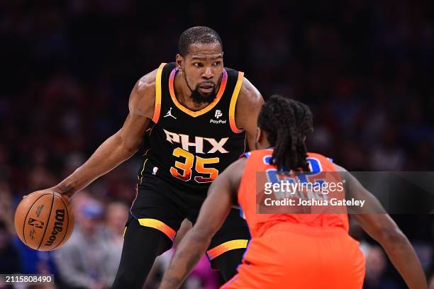 Kevin Durant of the Phoenix Suns looks to drive the ball during the second half against the Oklahoma City Thunder at Paycom Center on March 29, 2024...