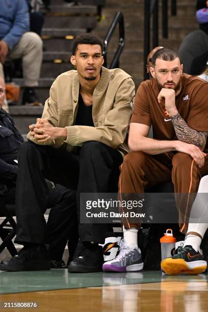 Victor Wembanyama and Sandro Mamukelashvili of the San Antonio Spurs look on during the game against the Phoenix Suns on March 25, 2024 at the AT&T...