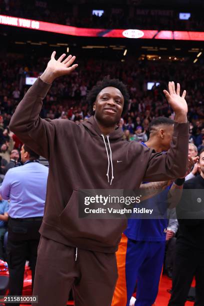 Anunoby of the New York Knicks is embraced by Toronto Raptors fans during the game on March 27, 2024 at the Scotiabank Arena in Toronto, Ontario,...