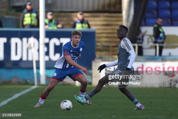 Louis Stephenson of Hartlepool United is in action with Andrew Oluwabori of Halifax Town during the Vanarama National League match between Hartlepool...