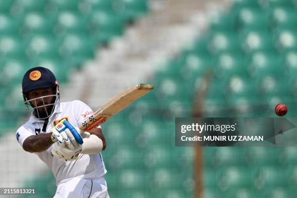 Sri Lanka's Kusal Mendis plays a shot during the first day of the second Test cricket match between Bangladesh and Sri Lanka at the Zahur Ahmed...