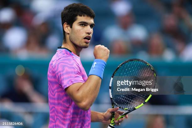 Carlos Alcaraz of Spain reacts during his men's singles match against Lorenzo Musetti of Italy during the Miami Open at Hard Rock Stadium on March...