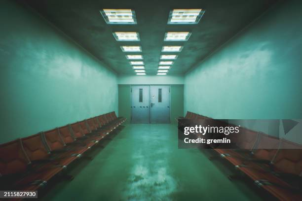 spooky retro waiting room with no people - horror movie stock pictures, royalty-free photos & images