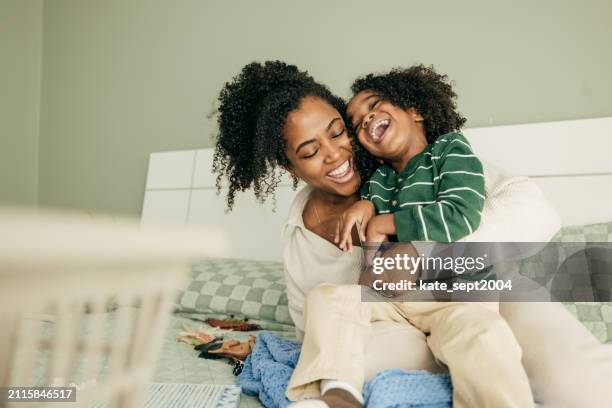 safe spaces: creating a kid-friendly home environment - kids laughing imagens e fotografias de stock