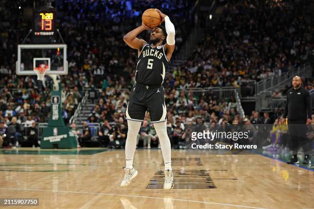 Malik Beasley of the Milwaukee Bucks takes a three point shot during the first half of a game against the Los Angeles Lakers at Fiserv Forum on March...