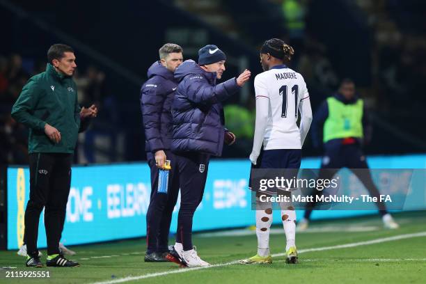 Lee Carsley, Manager of England gives instructions to Noni Madueke during the UEFA U21 Euro 2025 Qualifier between England and Luxembourg at...